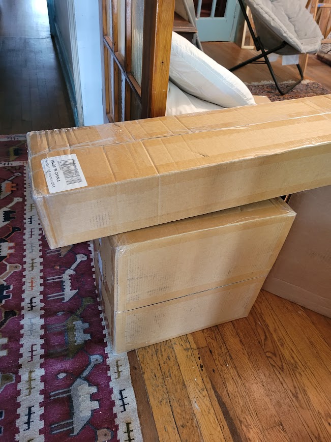 Shipping boxes containing bike parts