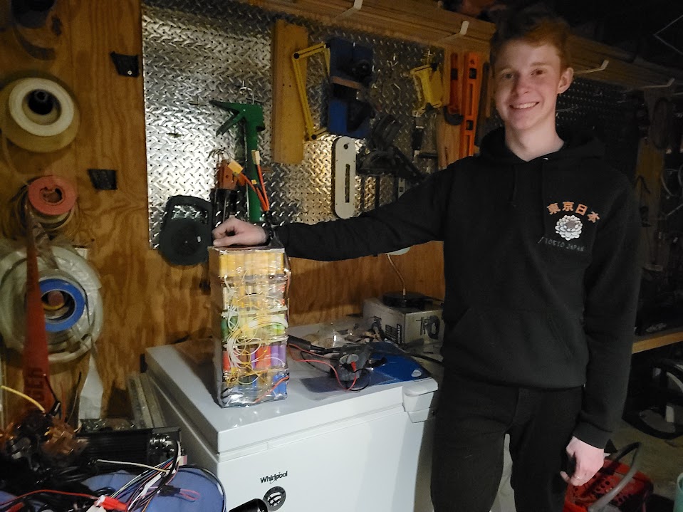 Me holding the finished battery pack